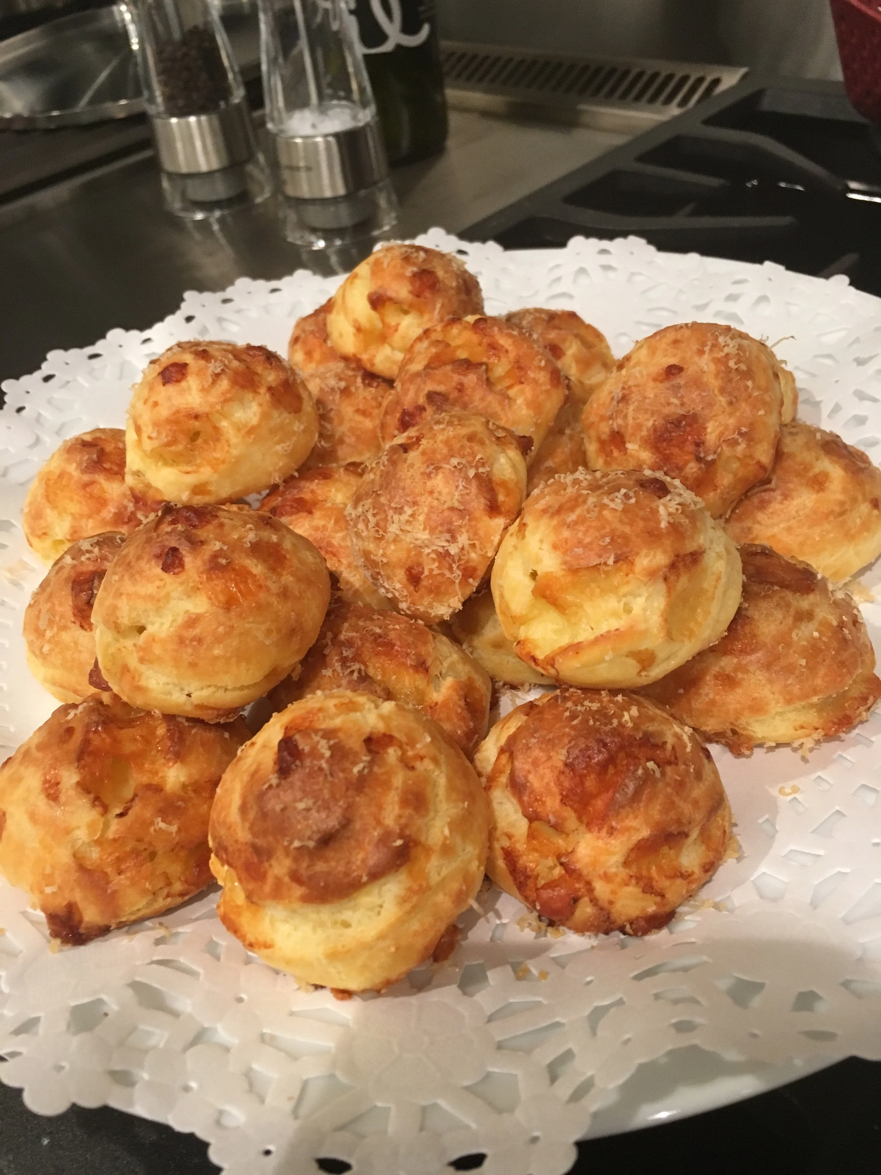 House-made Gruyère gougères with grated cheese at a Napa Valley private dinner
