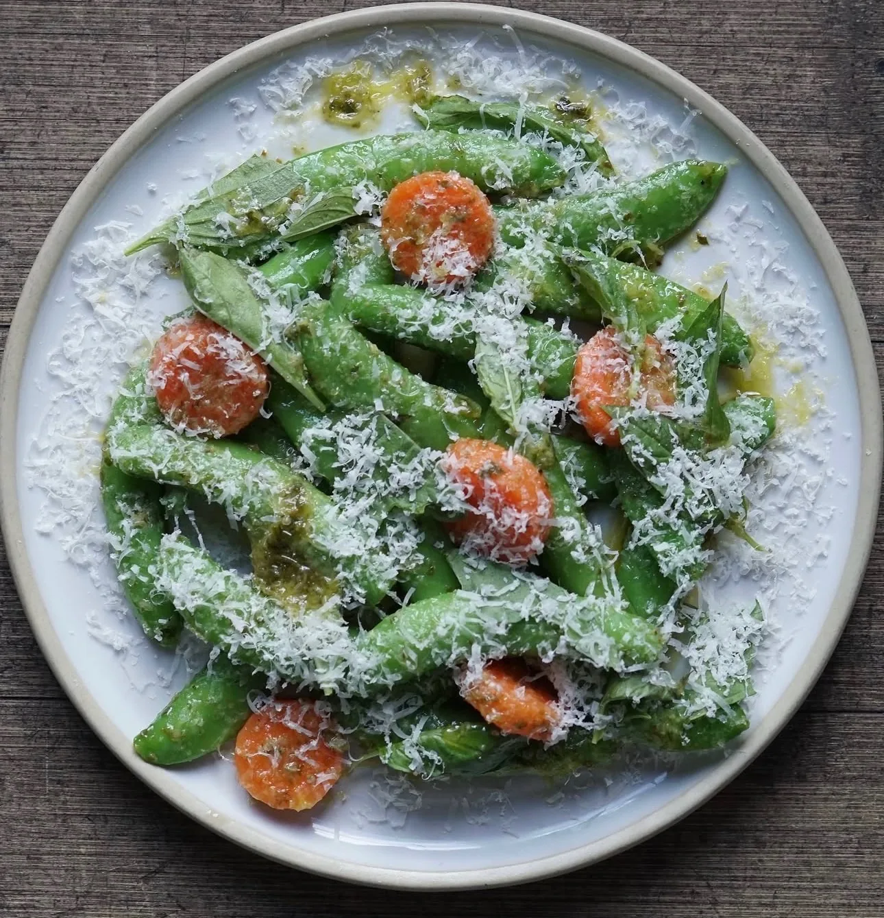 Charred sugar snap peas with carrot rounds, basil pesto and shaved parmesan — Montecito private chef garden plate